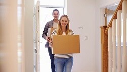 6 savings strategies for new homebuyers couple walking into new home