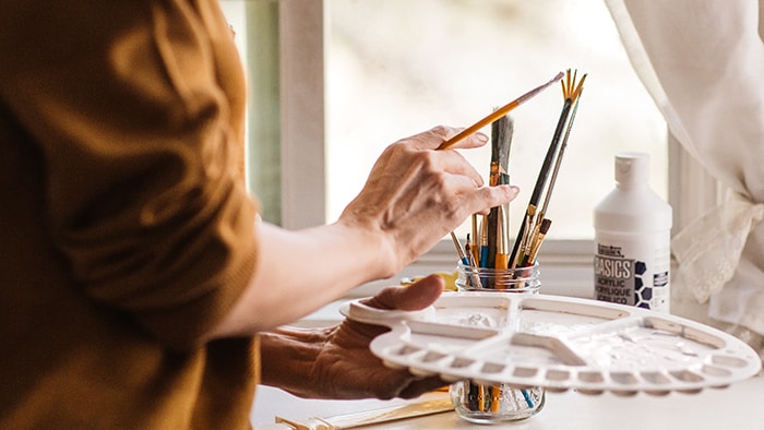 Doing it herself woman with paint brush