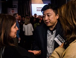 Shen Tong, founder of FOOD-X Shen Tong talking with people