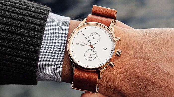 MVMT hand with wrist watch