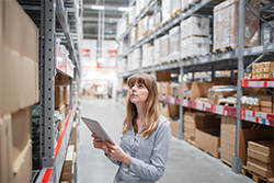 Warehouse your savings woman in warehouse store