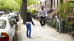 Checking, Savings and Credit Cards for Your Kids: When Do You Start? Dad doing jump ropes with girls
