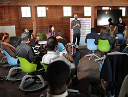 Business: The Girl Effect Accelerator classroom with lecturers
