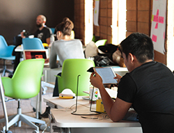 Girl Effect: Showing Businesses How to Do Good student working on various media