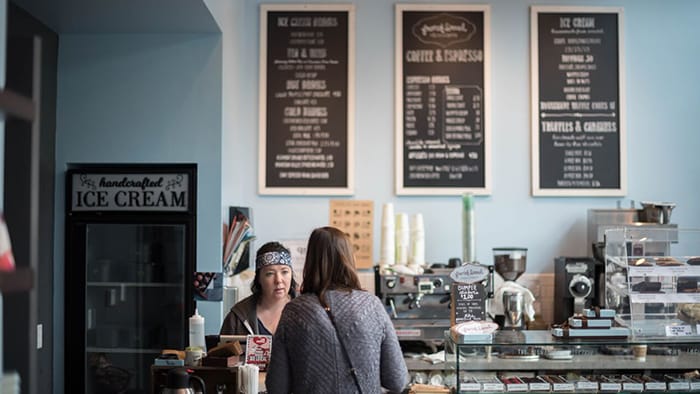 American South Food Editorial woman at chocolate bar counter