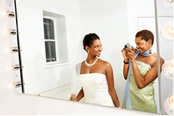 Bridesmaid dress as wedding dress Bridesmaid taking picture of bride