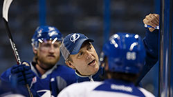 Into the Pros Coach Jon Cooper with players
