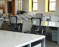 Your office is boring. Open desk office area.