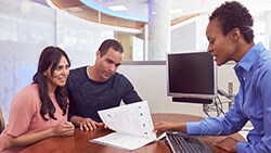 Working with a Financial Advisor Couple with Financial Advisor at Chase branch
