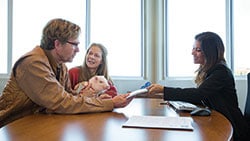 Getting Retirement Ready couple speaking with financial advisor