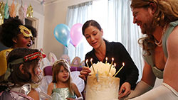 When and How to Save for College little girls enjoying party with parents
