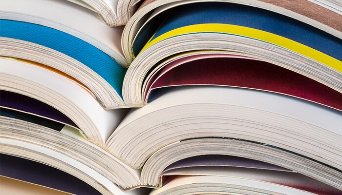 How to save money on college textbooks stack of textbooks