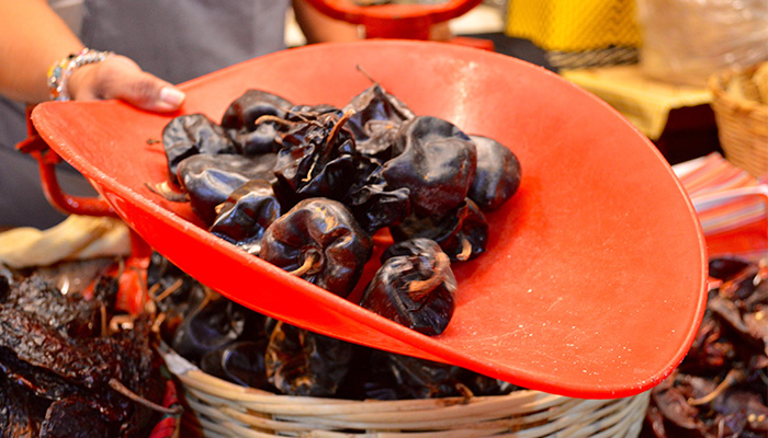 Top Chef Rodolfo Castellanos Different chilis in a pot,Chili vendors showing chili