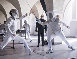 Students fencing Students fencing