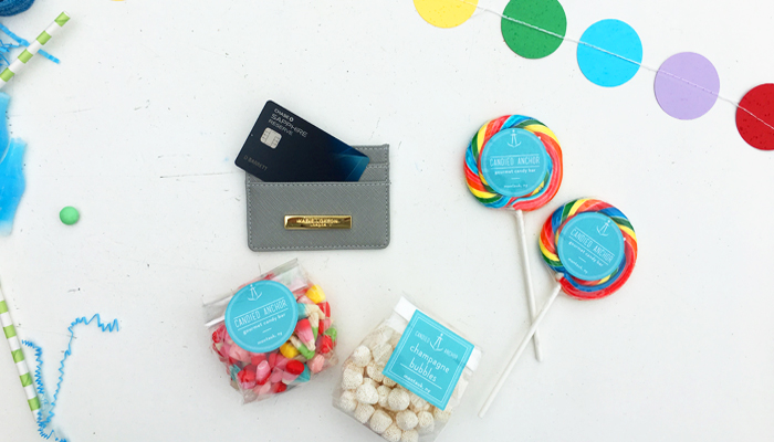 Montauk travel guide Chase Sapphire Reserve card on a table with some candy