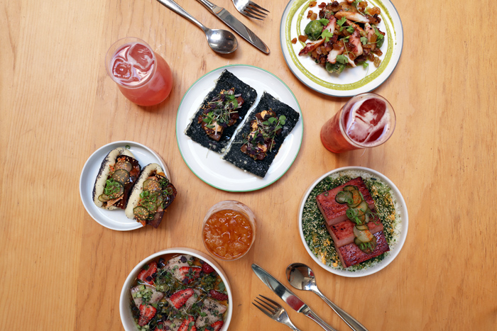 SF Travel Guide Hawaiian fusion food and drinks on table