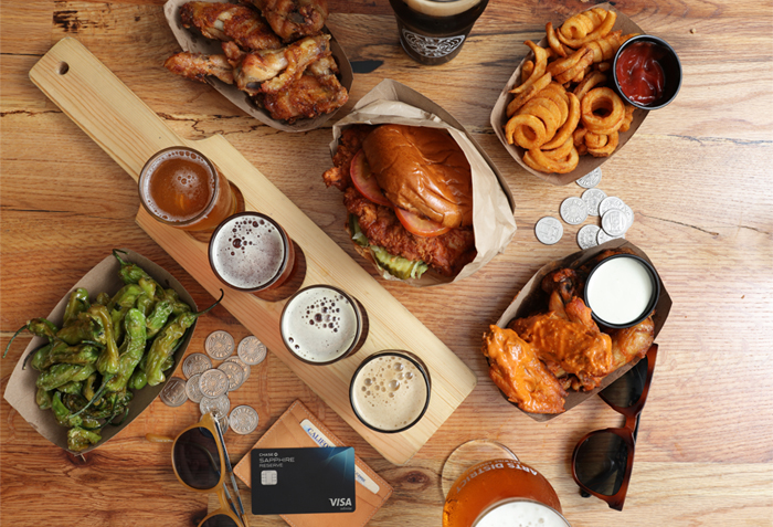 LA Travel Guide food and drinks on table along with Chase Sapphire card