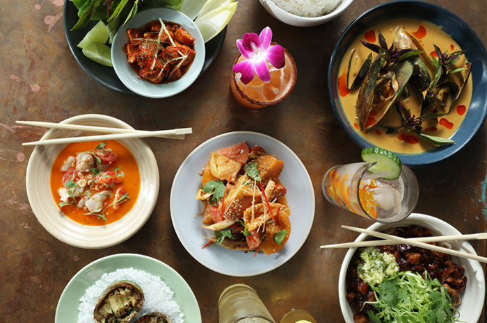LA Travel Guide Asian-inspired food with chop sticks and drinks on table