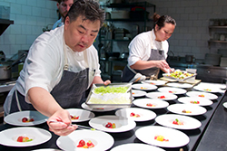 Chicago's Acadia chefs preparing dishes