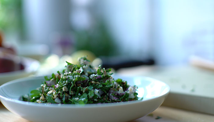 In the kitchen with: Alon Shaya salad plate on table