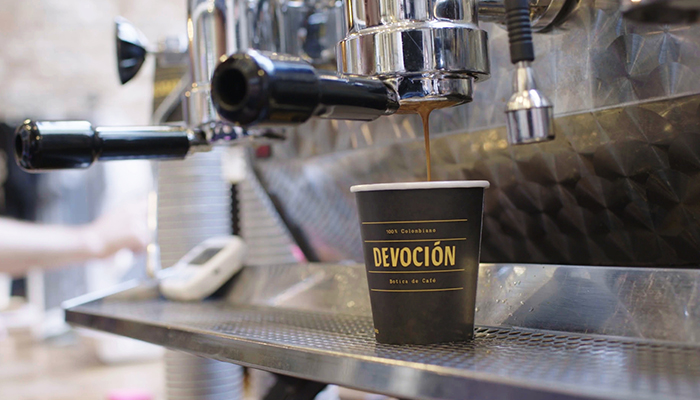 Devocion-Small Business Profile coffee machine pouring coffee in cup