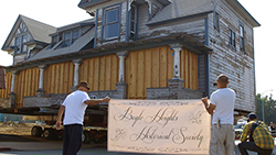 THE FIGHT FOR AFFORDABLE HOUSING House with sign for Boyle Heights Historical society