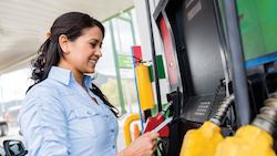 Putting Your Money to Work woman at the gas pump