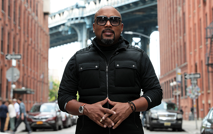 Daymond John - When to Seek Investors Daymond John posing on a street