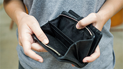 Checklist: How to survive a cash flow crunch person with open pocketbook in hand
