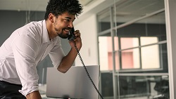How to build and motivate your team Office worker using the phone