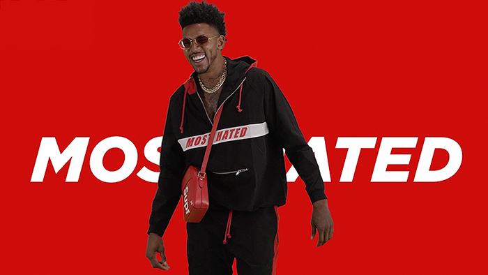 Nick Young hustles to build 'most hated' brand image# 2 Nick Young laughing in front of red background