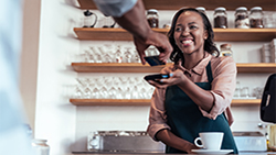 Worksheet: Getting to know your customer coffee shop employee taking credit card from customer