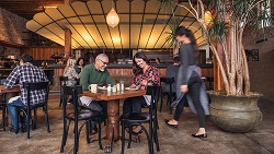 Do's and don'ts when friends and family fund your startup inside view of restaurant with customers sitting around