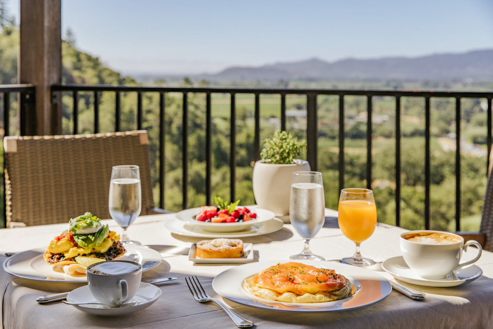 Display of breakfast foods on balcony dining table