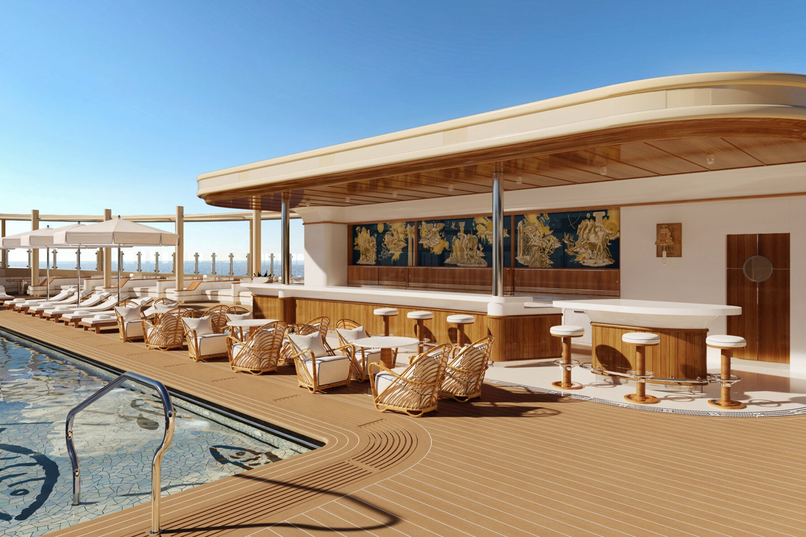 Pool deck with tan lounge chairs, white umbrellas, and a wooden bar, set against a bright blue sky and ocean view.