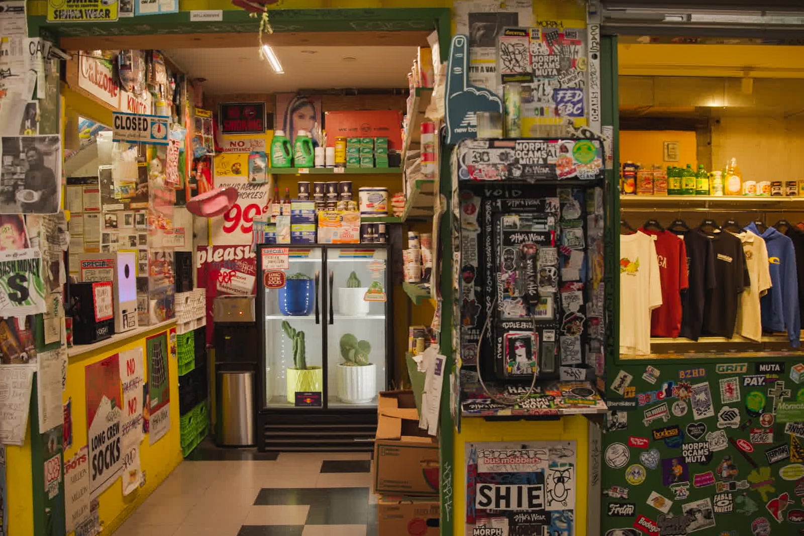 The walls of a store in Los Angeles are decorated with many stickers.