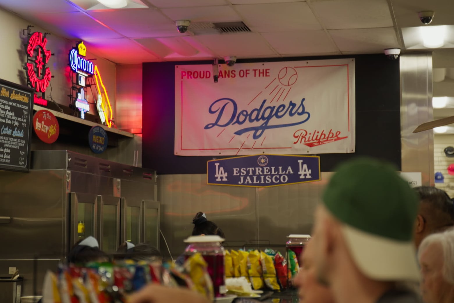 A flag reading Dodgers hangs in the restaurant in Philippe in Los Angeles, California.