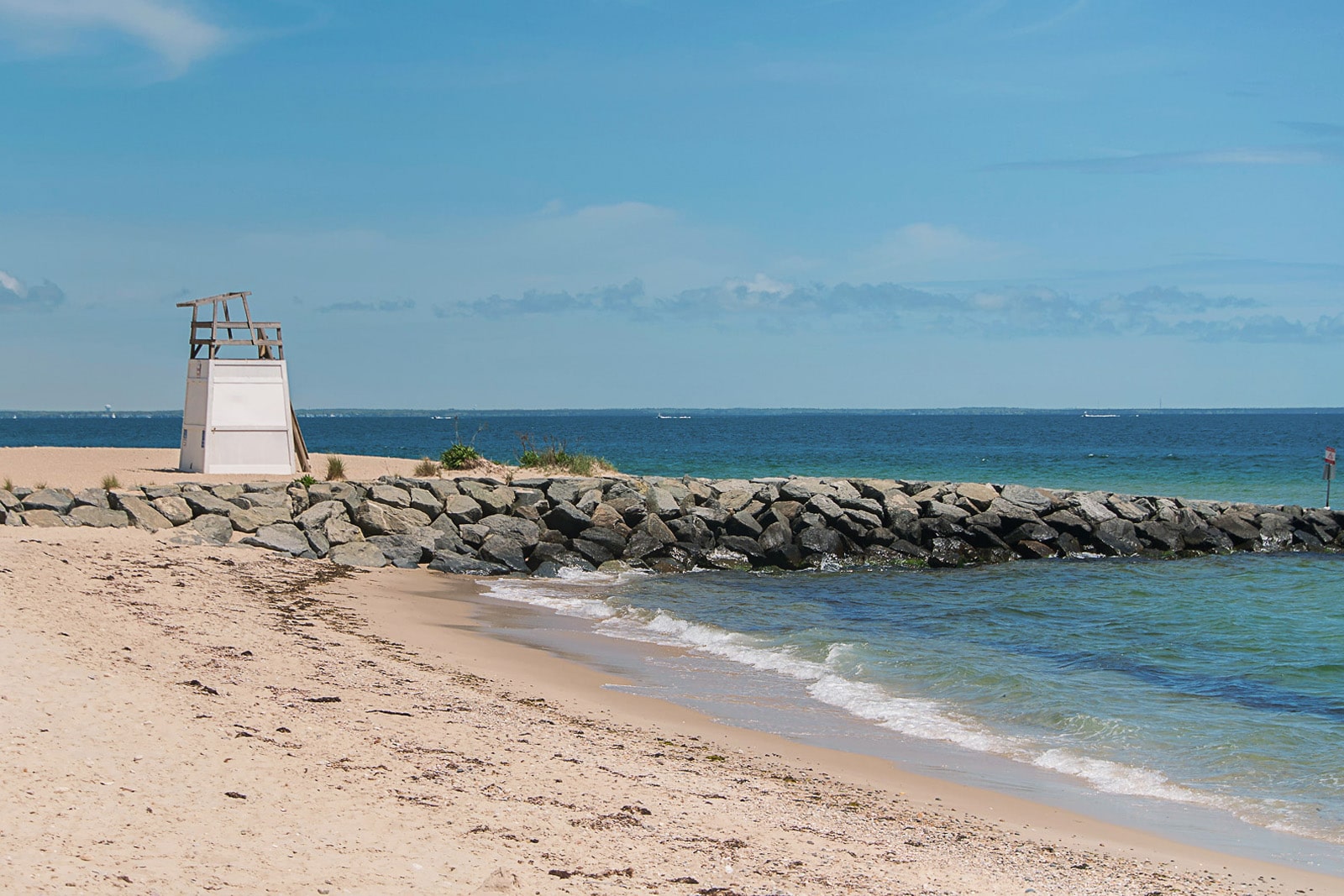A lifeguard stand sits at the shoreline on Inkwell Beach in Martha's Vineyard.