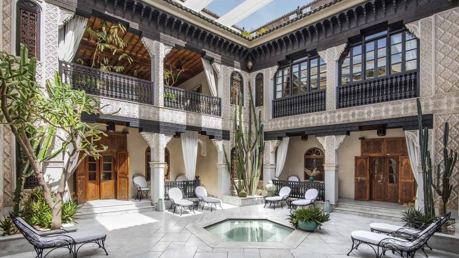 Courtyard with lounge seating and small pool