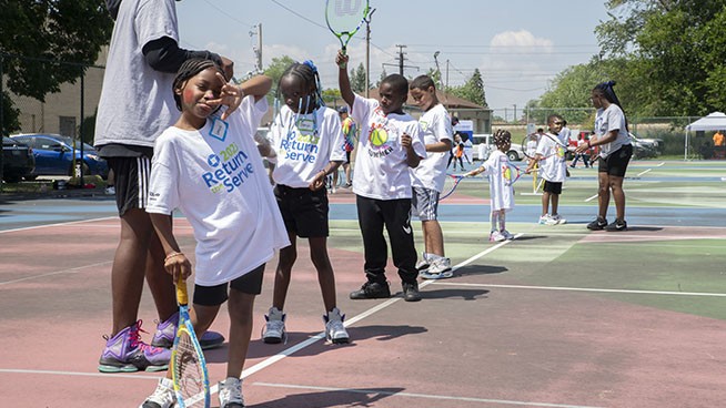 Tennis players practicing